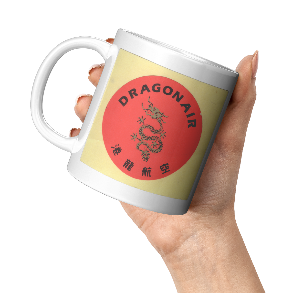 Dragonair_Vintage_Bag_Sticker_11oz_Coffe_11oz_White_LH_Model_Mockup.png_16301100