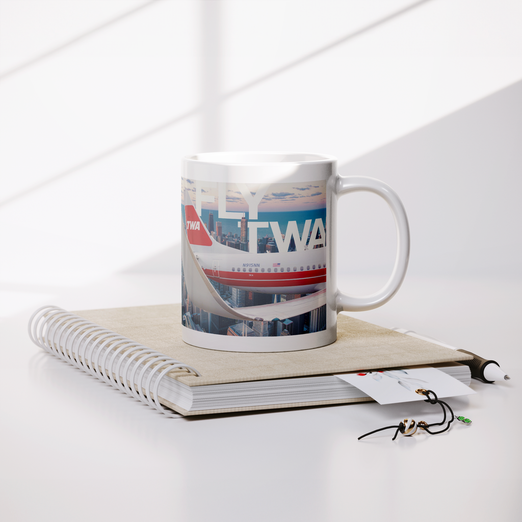 Fly_TWA_Coffee_Mug_Lifestyle_Notebook_Mockup.png_15476970