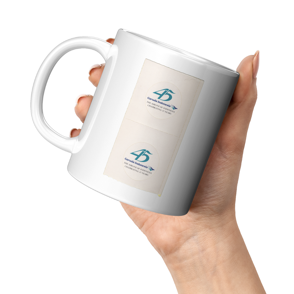 Garuda_Indonesia_Vintage_Celebrating_45__11oz_White_LH_Model_Mockup.png_16301625