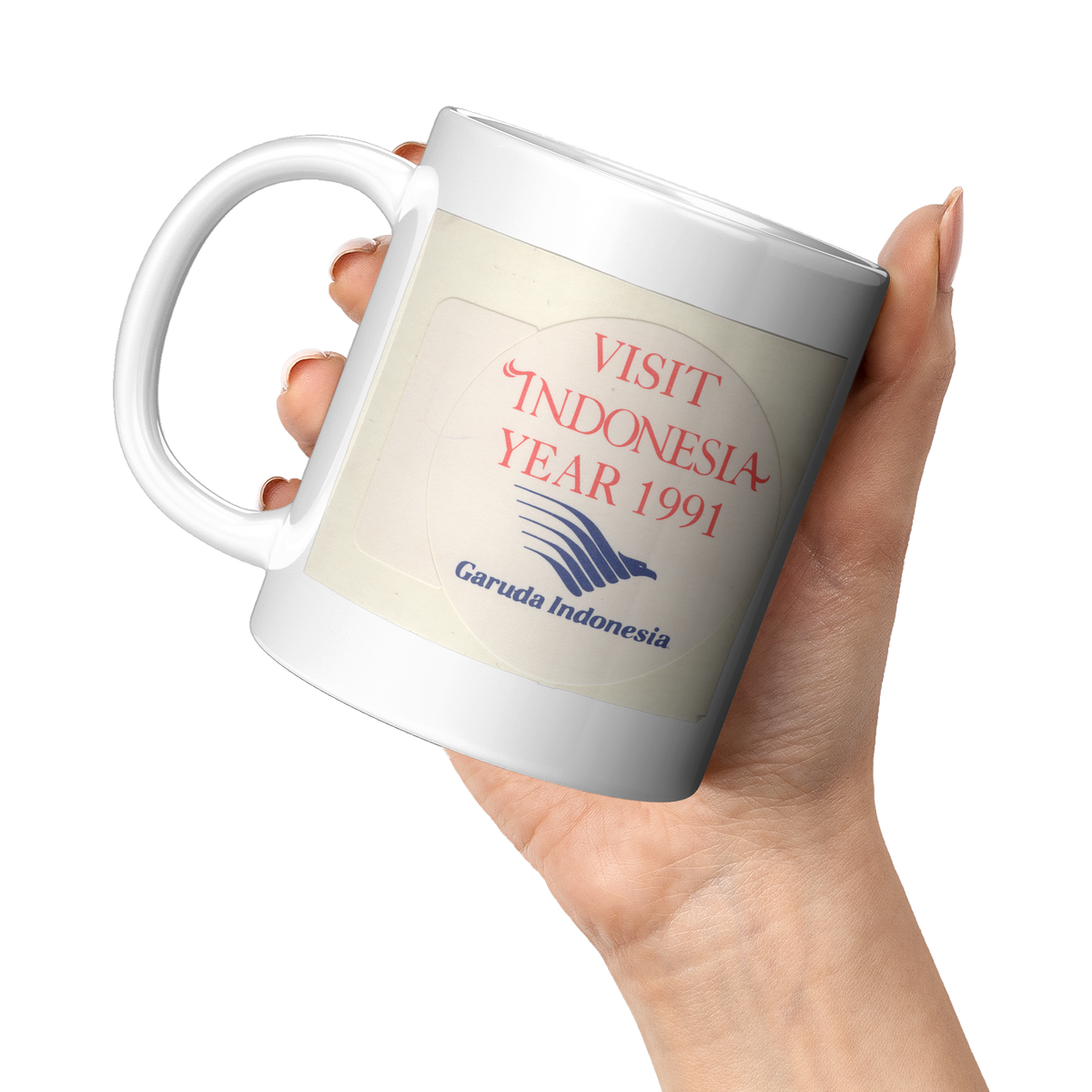 Garuda_Indonesia_Vintage_Visit_Indonesia_11oz_White_LH_Model_Mockup.png_16301635
