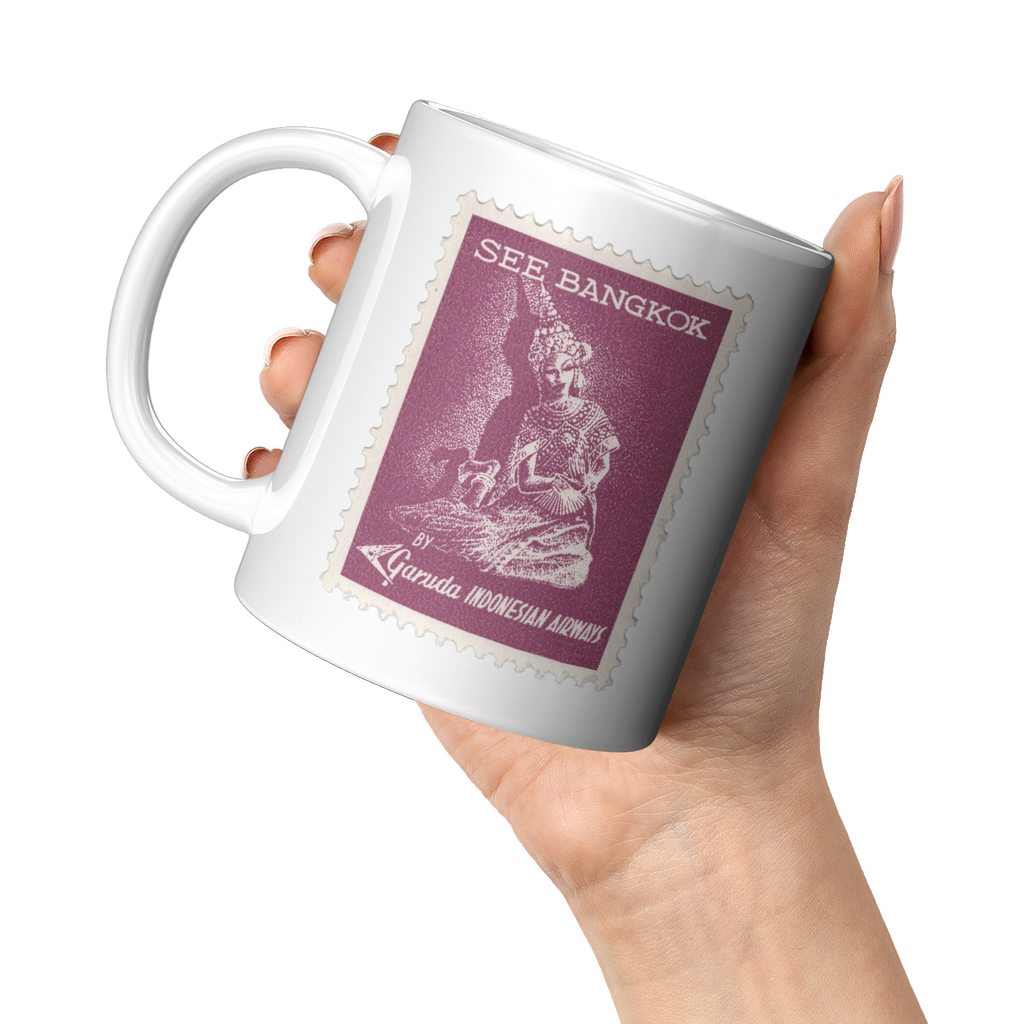 Garuda_Indonesian_Airways_Vintage_See_Ba_11oz_White_LH_Model_Mockup.png_16301674