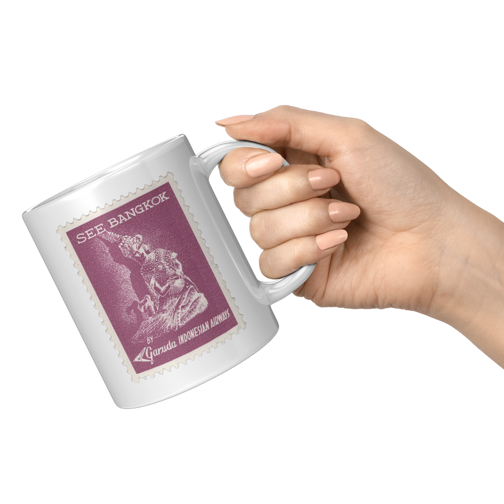 Garuda_Indonesian_Airways_Vintage_See_Ba_11oz_White_RH_Model_Mockup.png_16301676