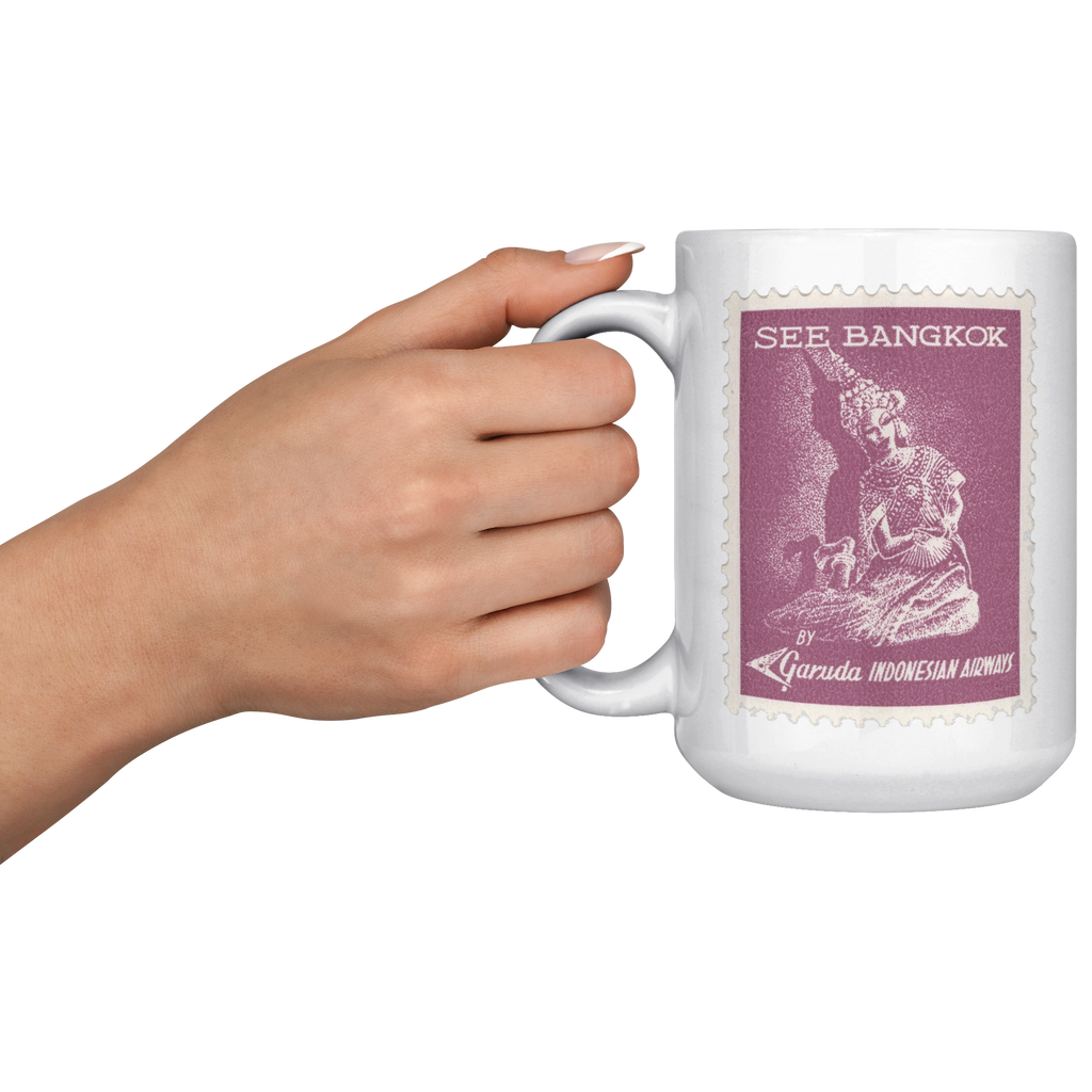 Garuda_Indonesian_Airways_Vintage_See_Ba_15oz_White_LH_Model_Mockup.png_16301679