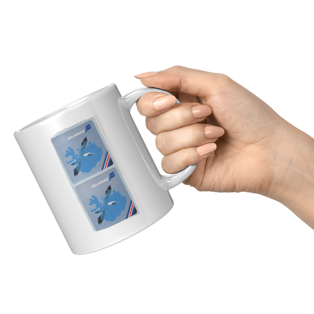 Icelandair_Vintage_Gannet_Stickers_11oz__11oz_White_RH_Model_Mockup.png_16301917