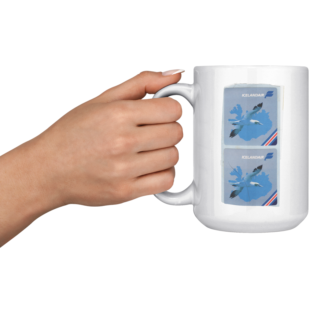 Icelandair_Vintage_Gannet_Stickers_15oz__15oz_White_LH_Model_Mockup.png_16301923