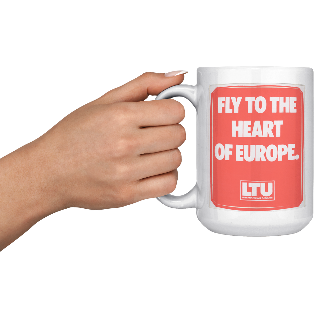 LTU_Fly_to_the_Heart_of_Europe_Vintage_B_15oz_White_LH_Model_Mockup.png_16302419