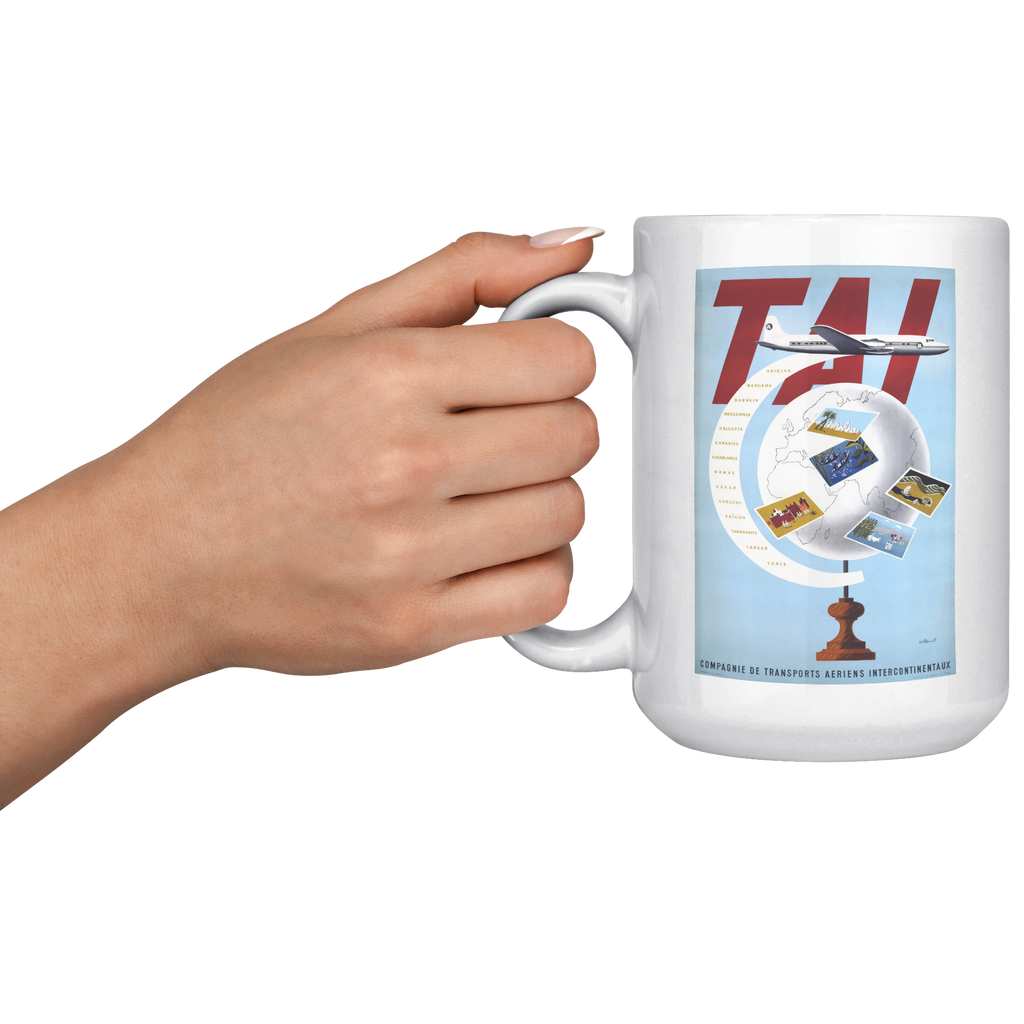 TAI_Vintage_1950_Globe_and_Tail_Travel_P_15oz_White_LH_Model_Mockup.png_16298494