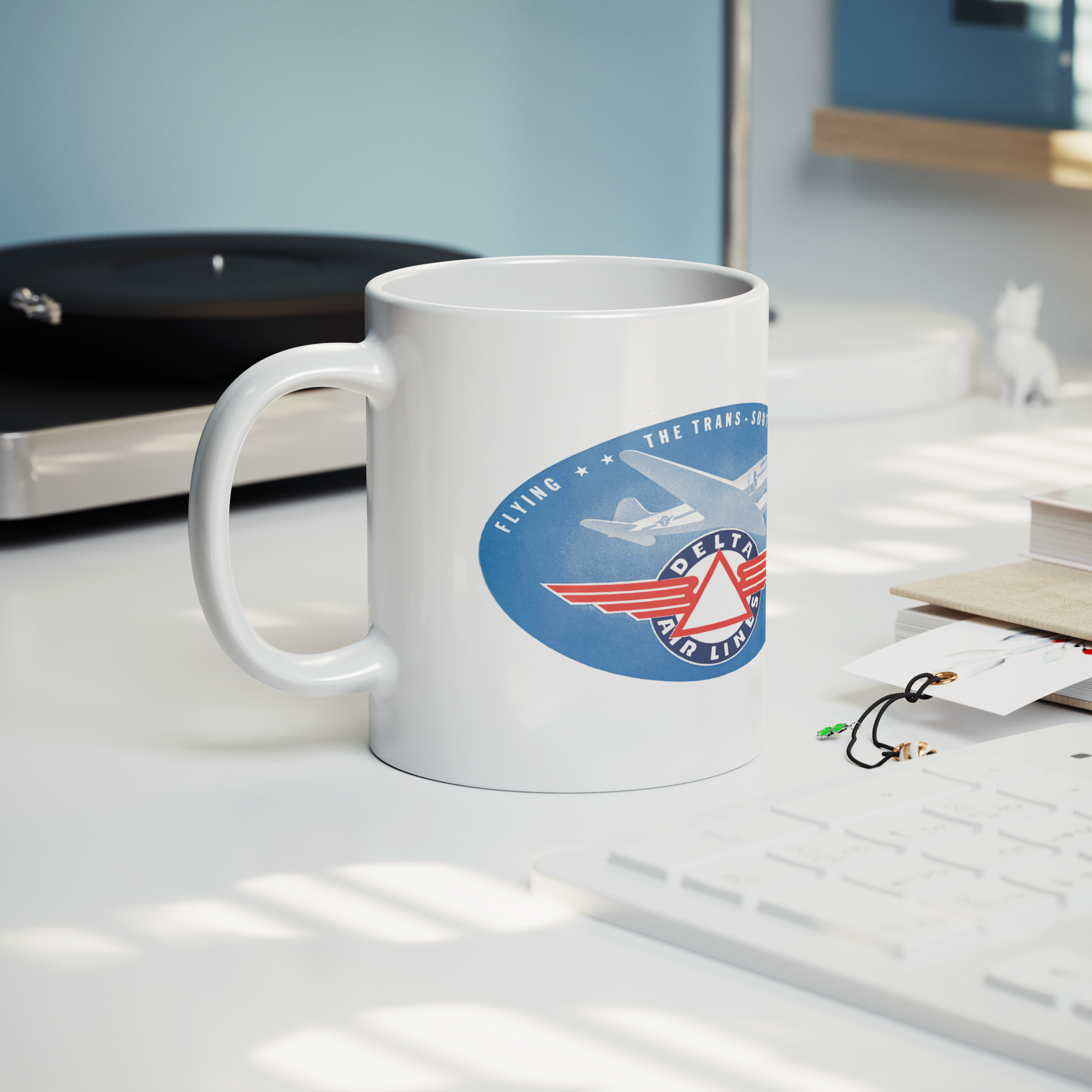 Vintage_Delta_Air_Lines_1930s_Bag_Stick_Lifestyle_Record_Player_Mockup.png_15476999